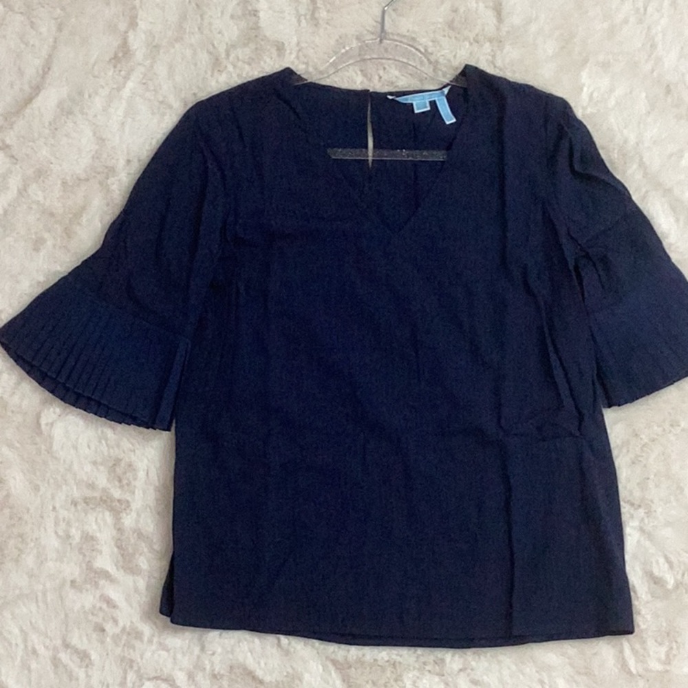 Draper James navy blouse with ruffle arm hem